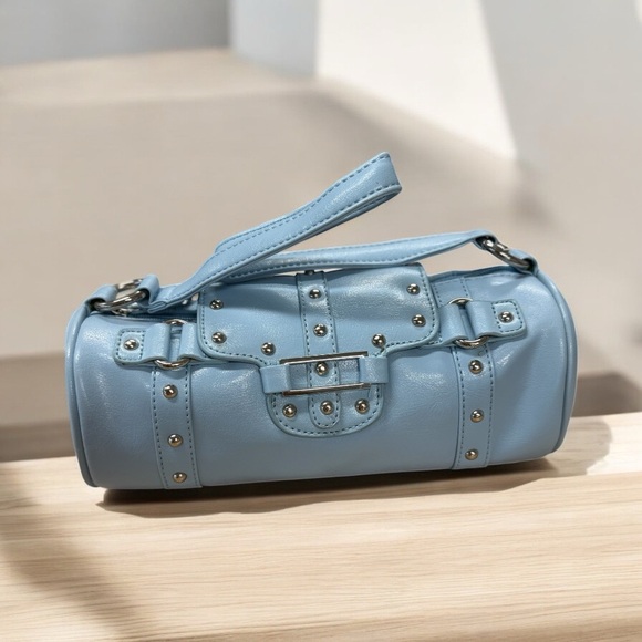 ampere Handbags - Powder Blue Clutch with Silver Accents